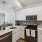 kitchen with white shaker cabinets at Bainbridge Creekside in New Braunfels, TX