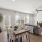 dining table for four overseeing living room of model home at Bainbridge Creekside in New Braunfels, TX